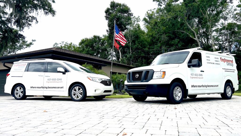 image displays two company vehicles belonging to Engineered Group